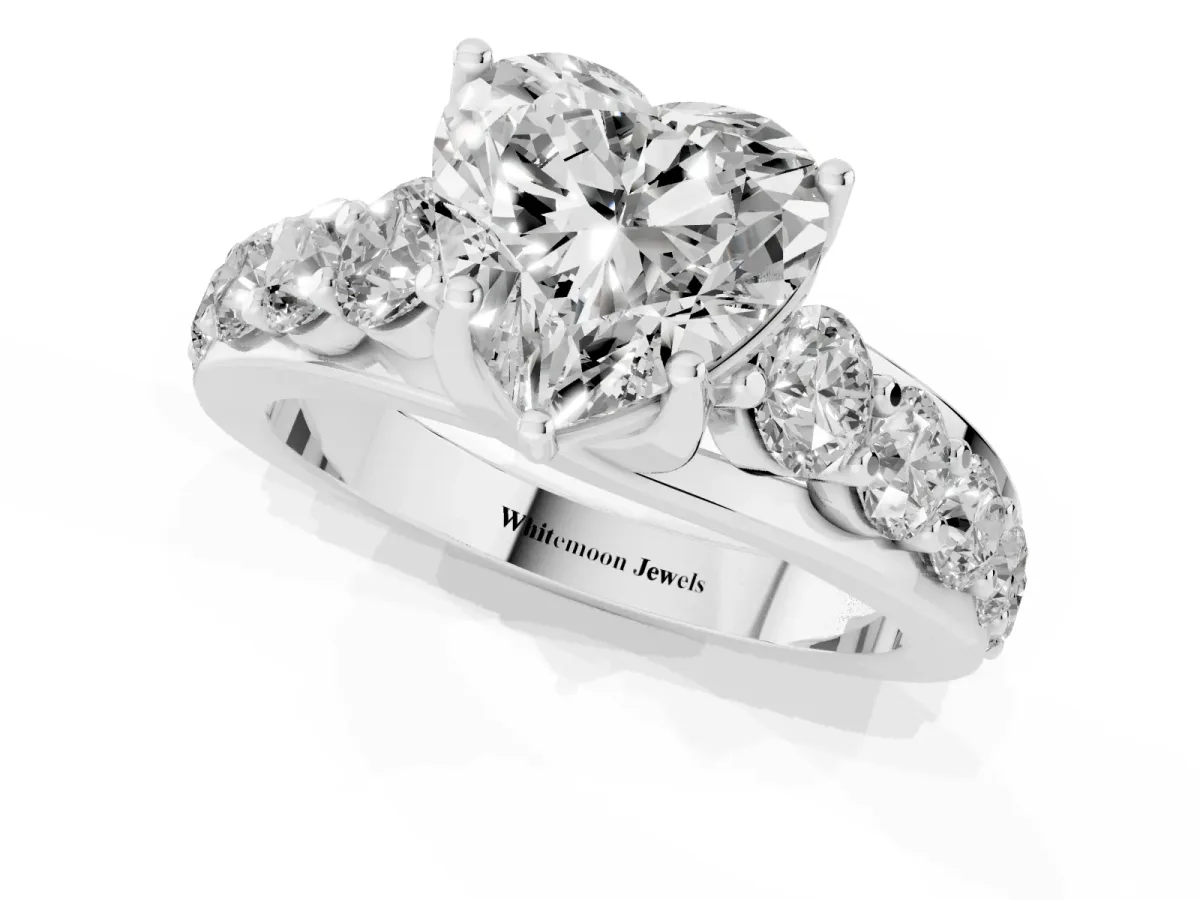 Heart Cut Diamond Engagement Ring with Pavé Band and Four-Prong Setting Silver