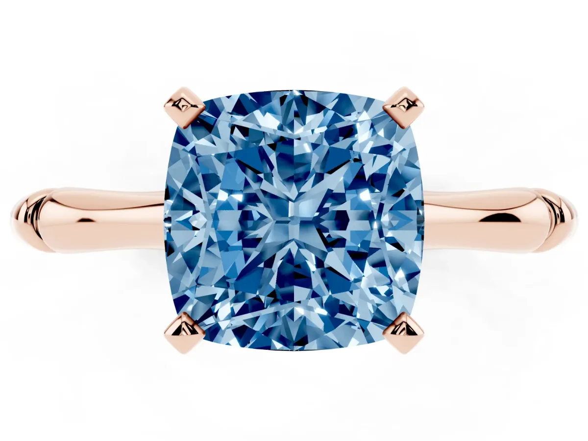 Fancy Blue Cushion Cut Solitaire Diamond Ring with Bamboo Band and Four-Prong Setting Rose gold
