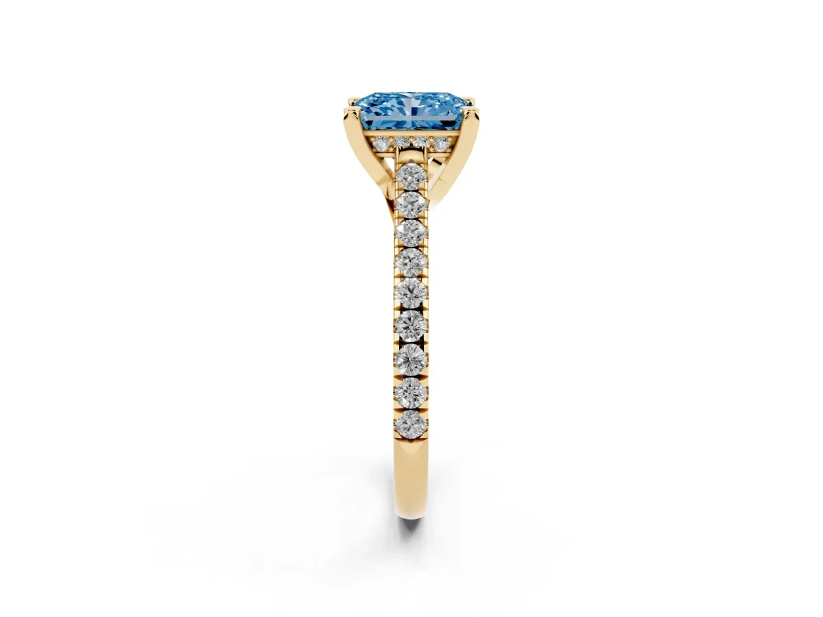 Fancy Blue Radiant Cut Brilliant Diamond Solitaire with Pavé Band and Four-Prong Setting Yellow gold