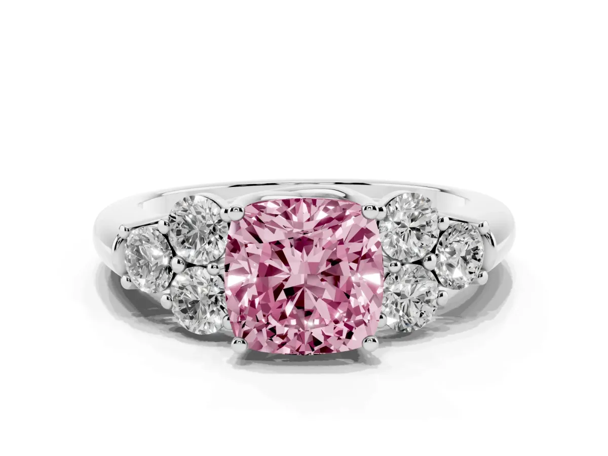 Fancy Pink Cushion Cut Cut Diamond Cluster Ring with Round Accent Stones and Prong Setting on a Classic Band Platinum