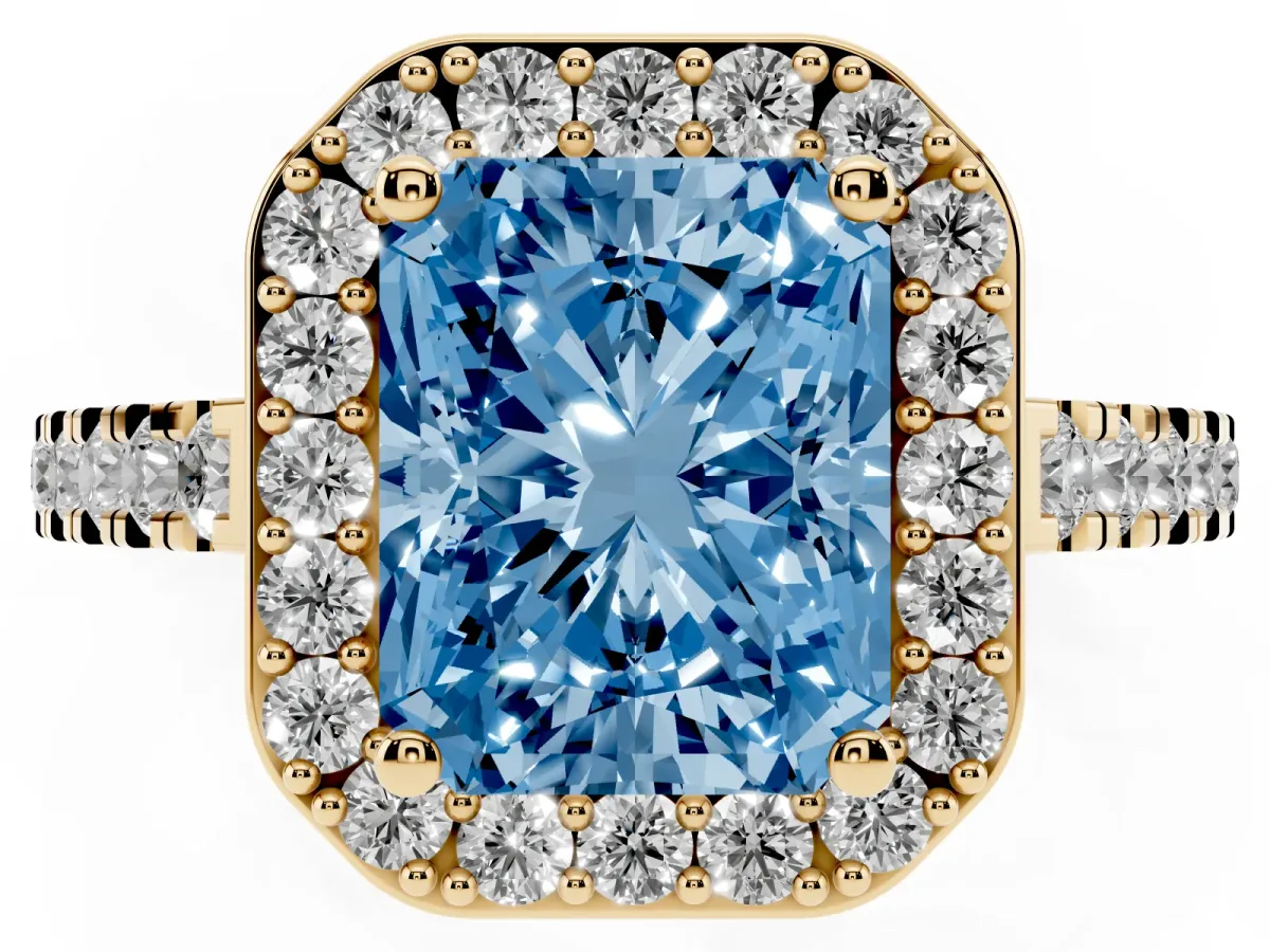 Fancy Blue Radiant Cut Diamond Halo Ring with Round Pavé Split Shank and Prong Setting Yellow gold