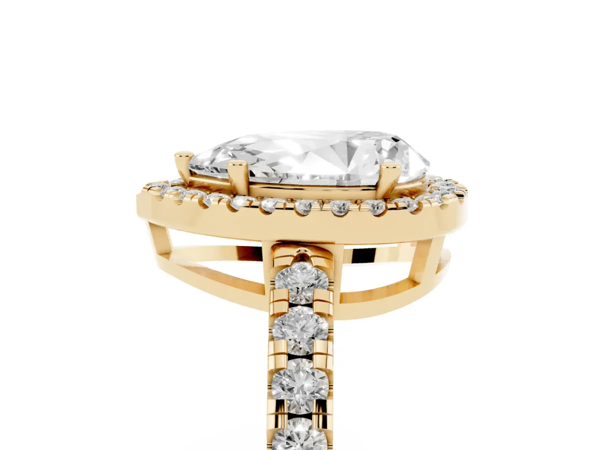 Pear Cut Diamond Halo Ring with Pavé Band and Four-Prong Setting Yellow gold