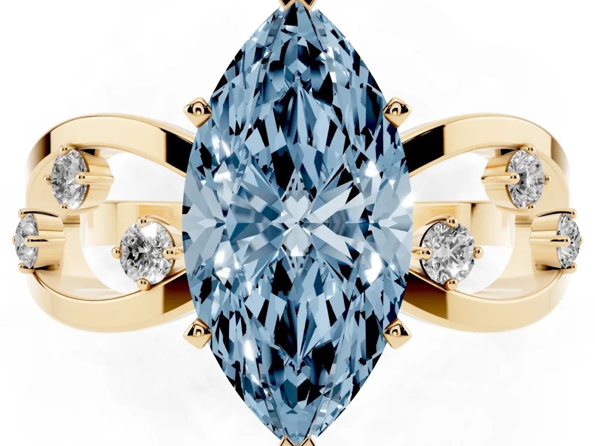 Fancy Blue Marquise Cut Cut Solitaire Diamond with Side Stones on Criss-Cross Band and Four-Prong Setting Yellow gold