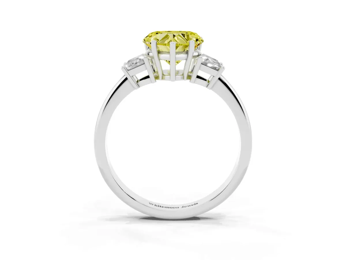 Fancy Yellow Heart Cut Diamond Three-Stone Ring with Trapezoid Side Stones and Prong Setting Silver