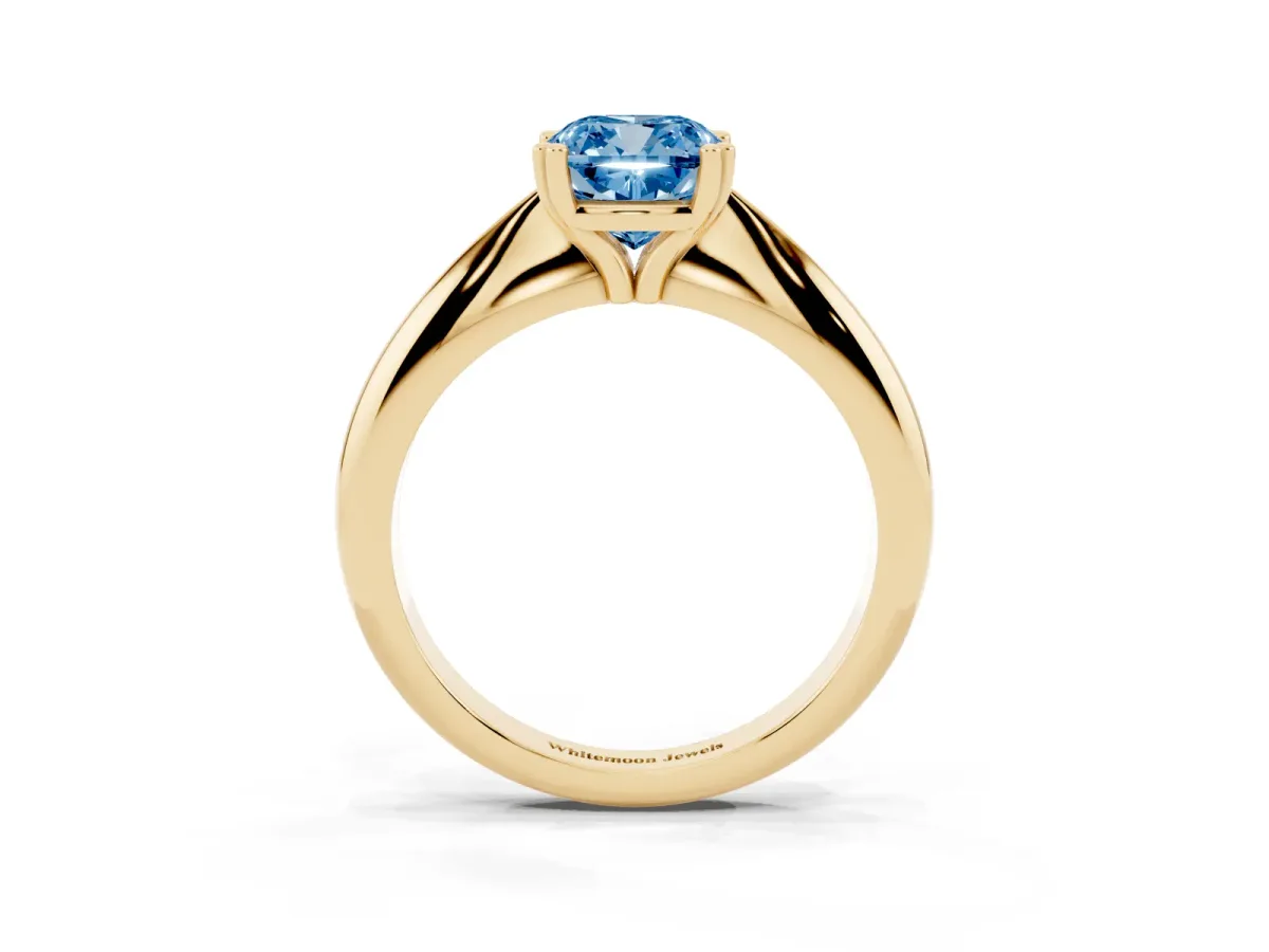 Fancy Blue Cushion Cut Cut Solitaire Engagement Ring with Tapered Band and Four-Prong Setting Yellow gold
