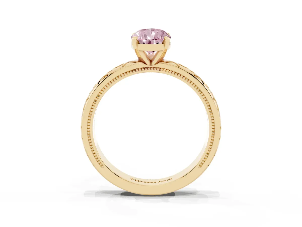 Fancy Pink Pear Cut Solitaire Engagement Ring with Scrollwork Band and Four-Prong Setting Yellow gold