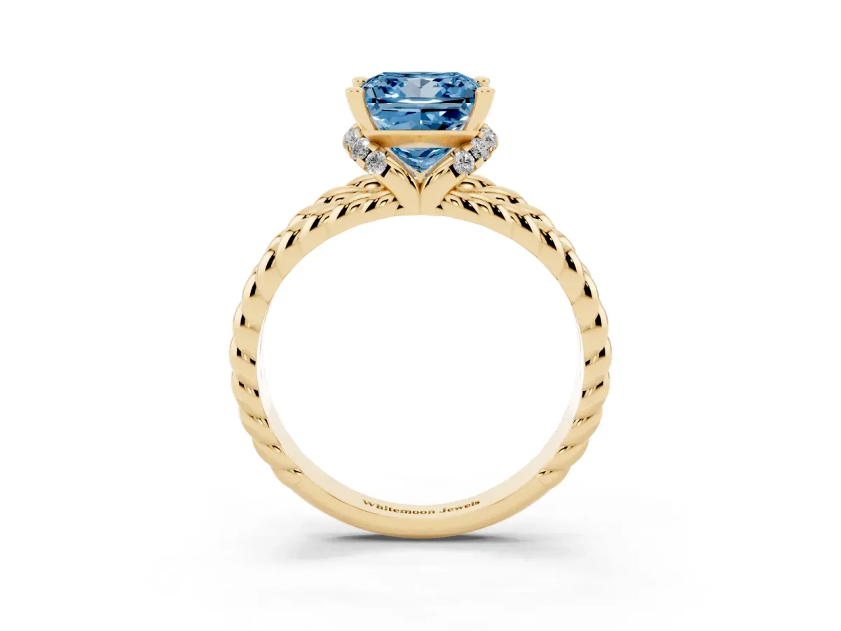 Fancy Blue Princess Cut Halo Twisted Band Four-Prong Ring Yellow gold