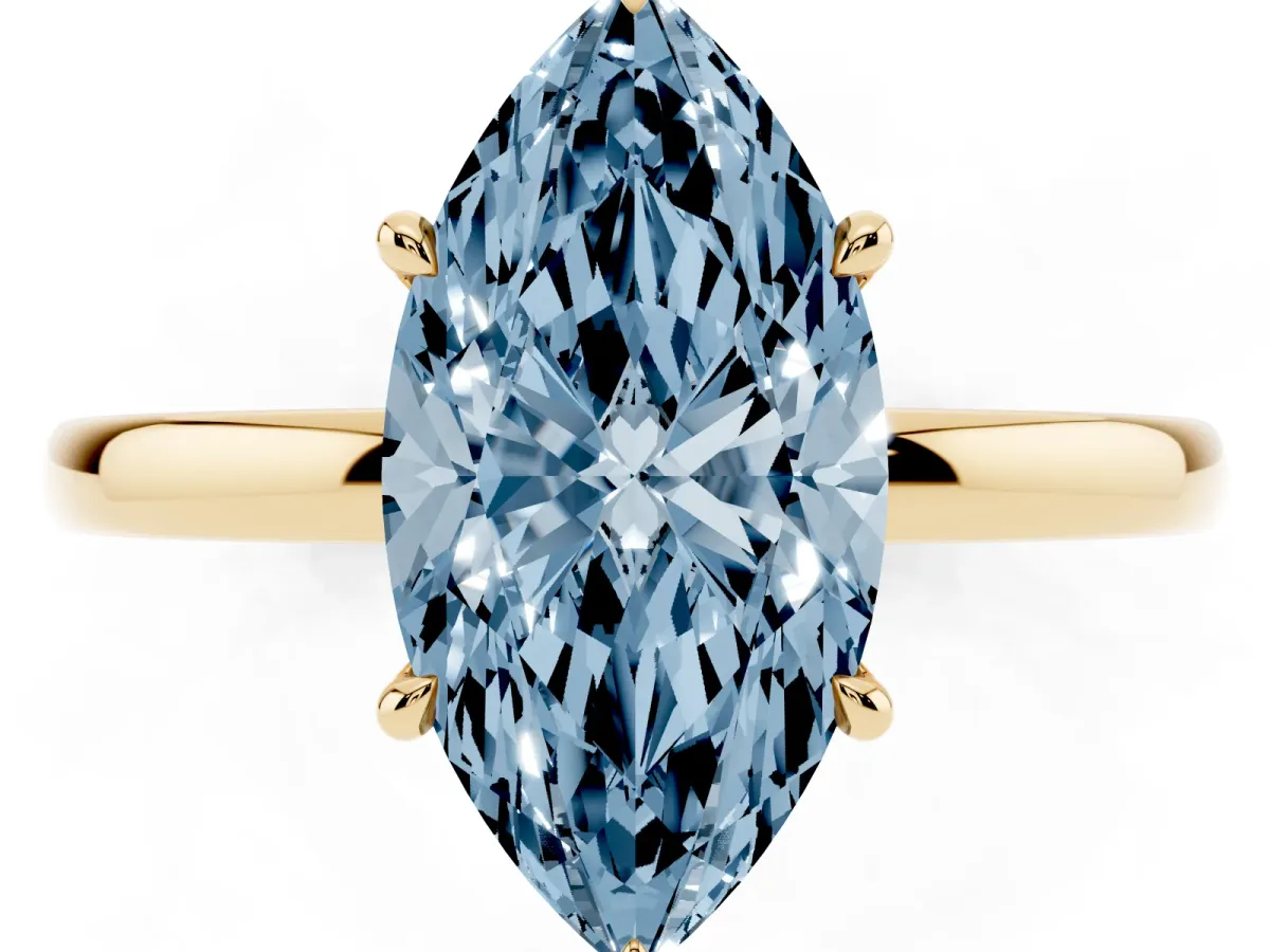 Fancy Blue Marquise Cut Solitaire Engagement Ring with Cathedral Band and Four-Prong Setting Yellow gold