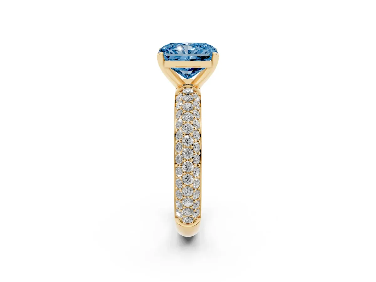 Fancy Blue Radiant Cut Diamond Solitaire Ring with Prong Setting and Pavé Band Yellow gold