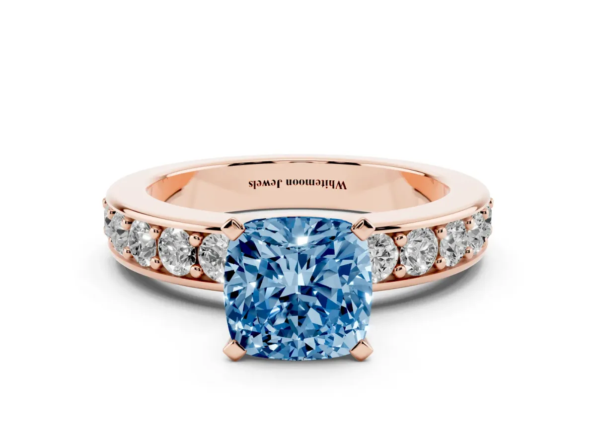 Fancy Blue Cushion Cut Diamond Engagement Ring with Channel Set Round Band and Prong Setting Rose gold