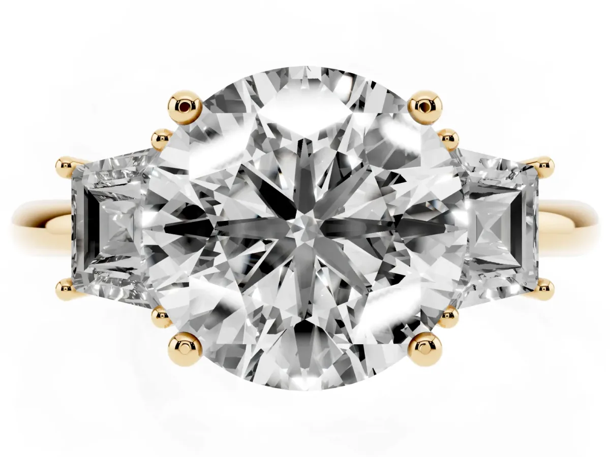 Round Cut Diamond Three-Stone Ring with Trapezoid Side Stones and Prong Setting Yellow gold