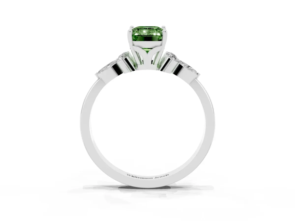 Fancy Green Emerald Cut Brilliant Diamond Solitaire Ring with Pear Side Stones and Four-Prong Setting Platinum