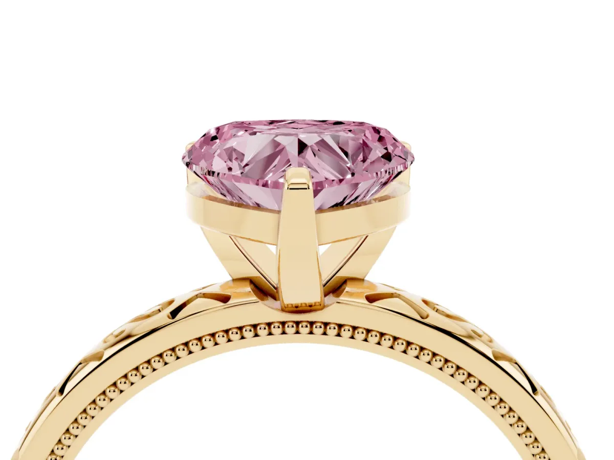 Fancy Pink Heart Cut Solitaire Engagement Ring with Scrollwork Band and Four-Prong Setting Yellow gold