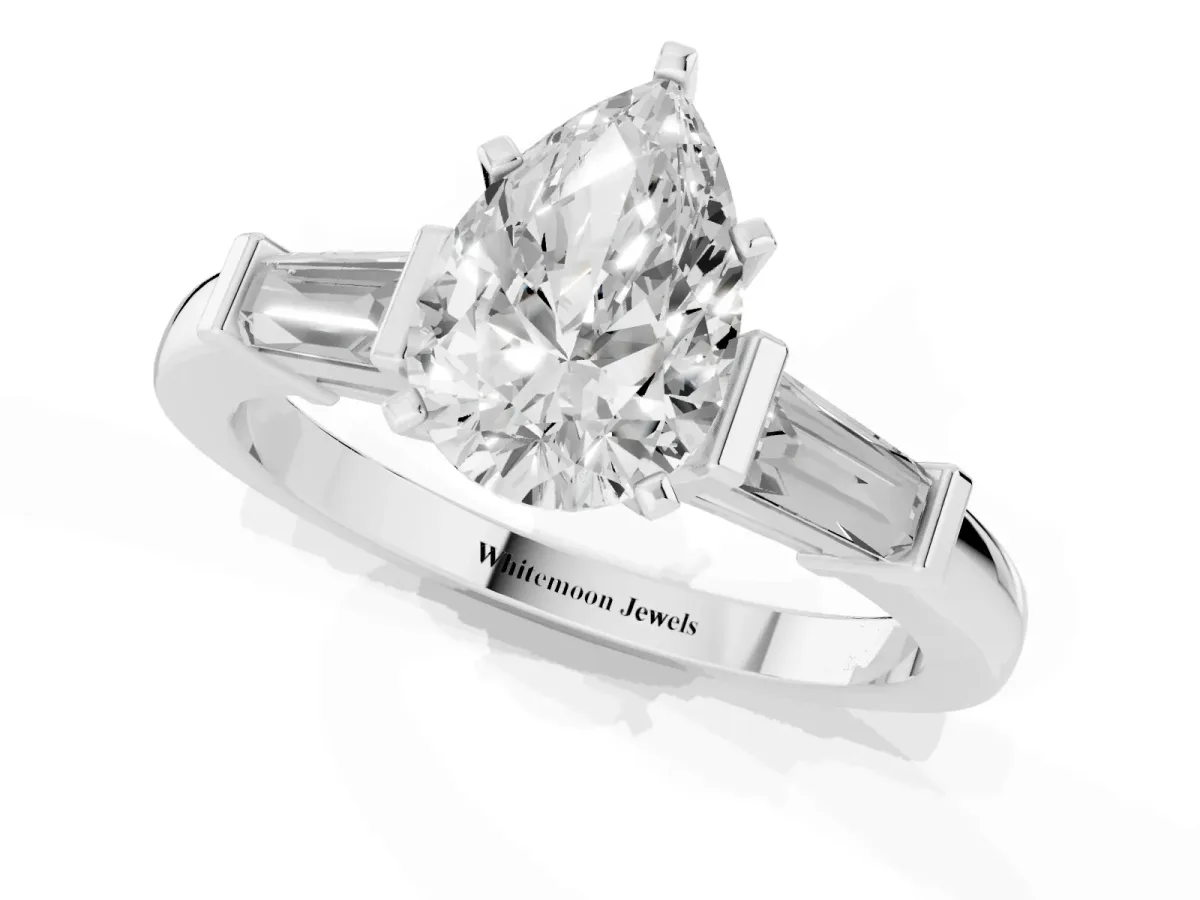 Pear Cut Cut Diamond Solitaire Ring with Tapered Baguette Accents and Four-Prong Setting White gold