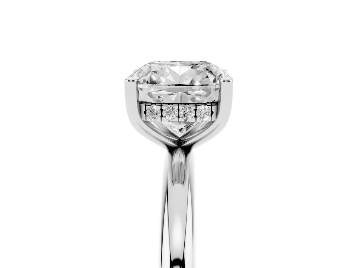 Cushion Cut Cut Solitaire Engagement Ring with Four-Prong Setting and Classic Band Silver