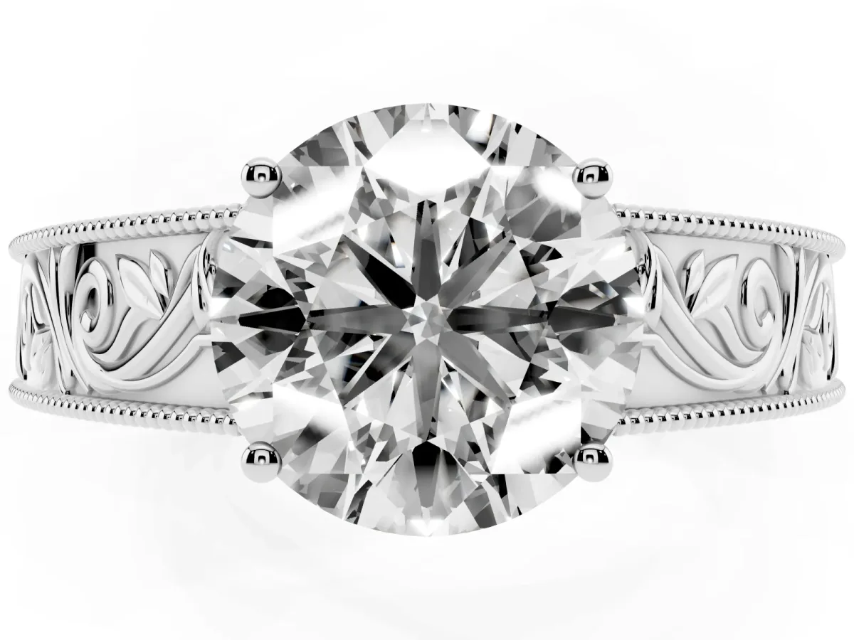 Round Cut Diamond Solitaire Ring with Engraved Band and Four-Prong Setting White gold