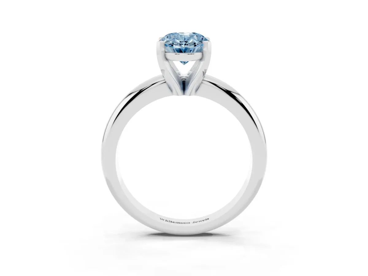 Fancy Blue Oval Cut Diamond Solitaire Engagement Ring with Round Band and Four-Prong Setting Platinum