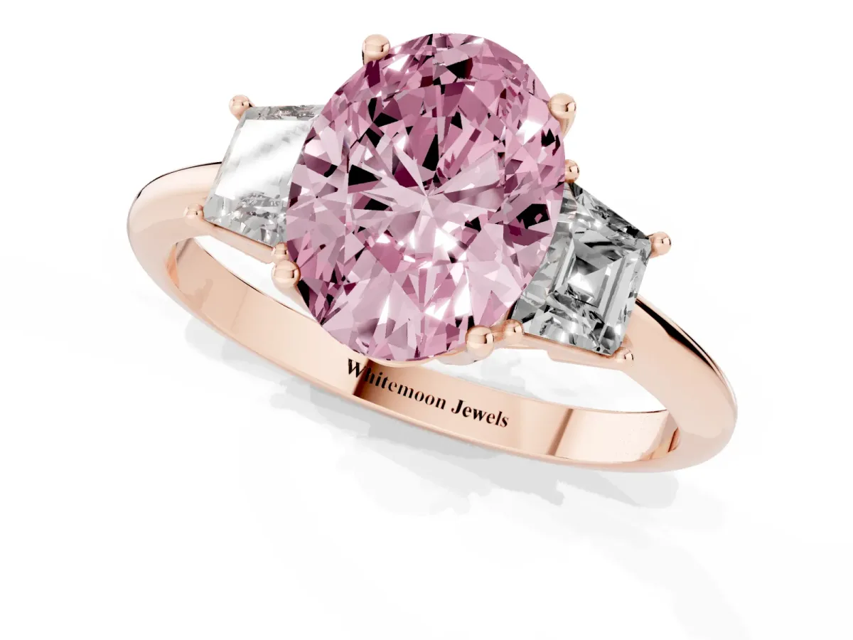 Fancy Pink Oval Cut Diamond Three-Stone Ring with Trapezoid Side Stones and Prong Setting Rose gold