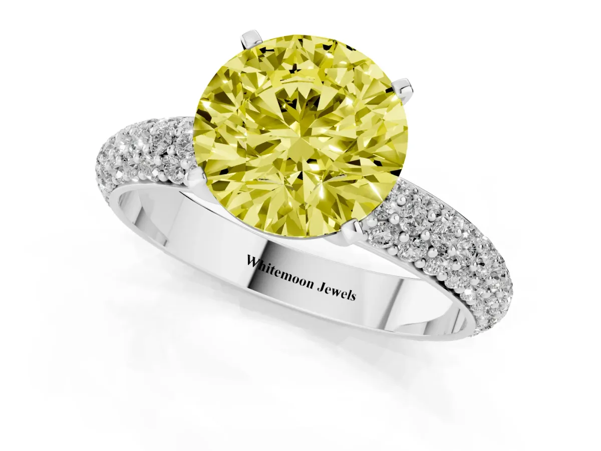 Fancy Yellow Round Cut Diamond Solitaire Ring with Prong Setting and Pavé Band Silver