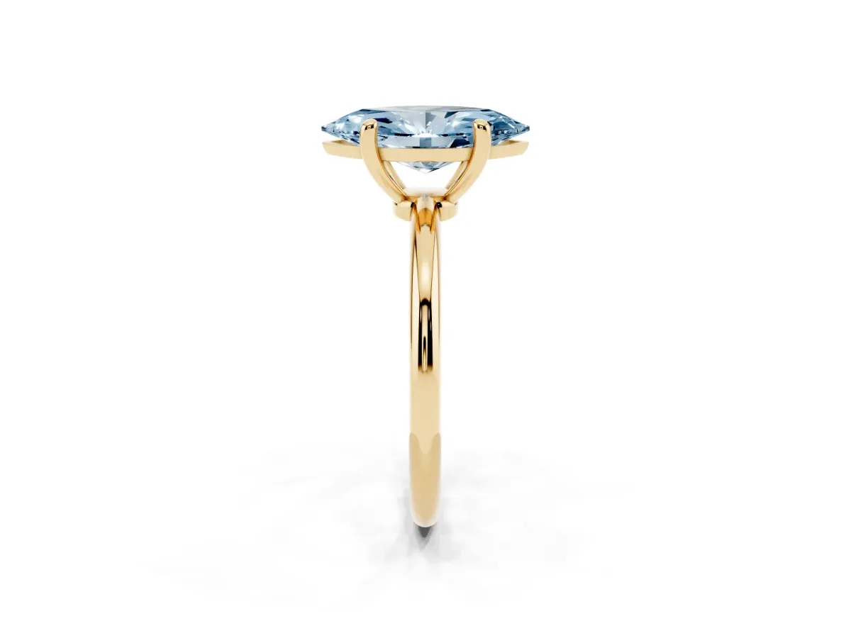 Fancy Blue Marquise Cut Solitaire Diamond Ring with 4-Prong Setting on a Classic Band Yellow gold