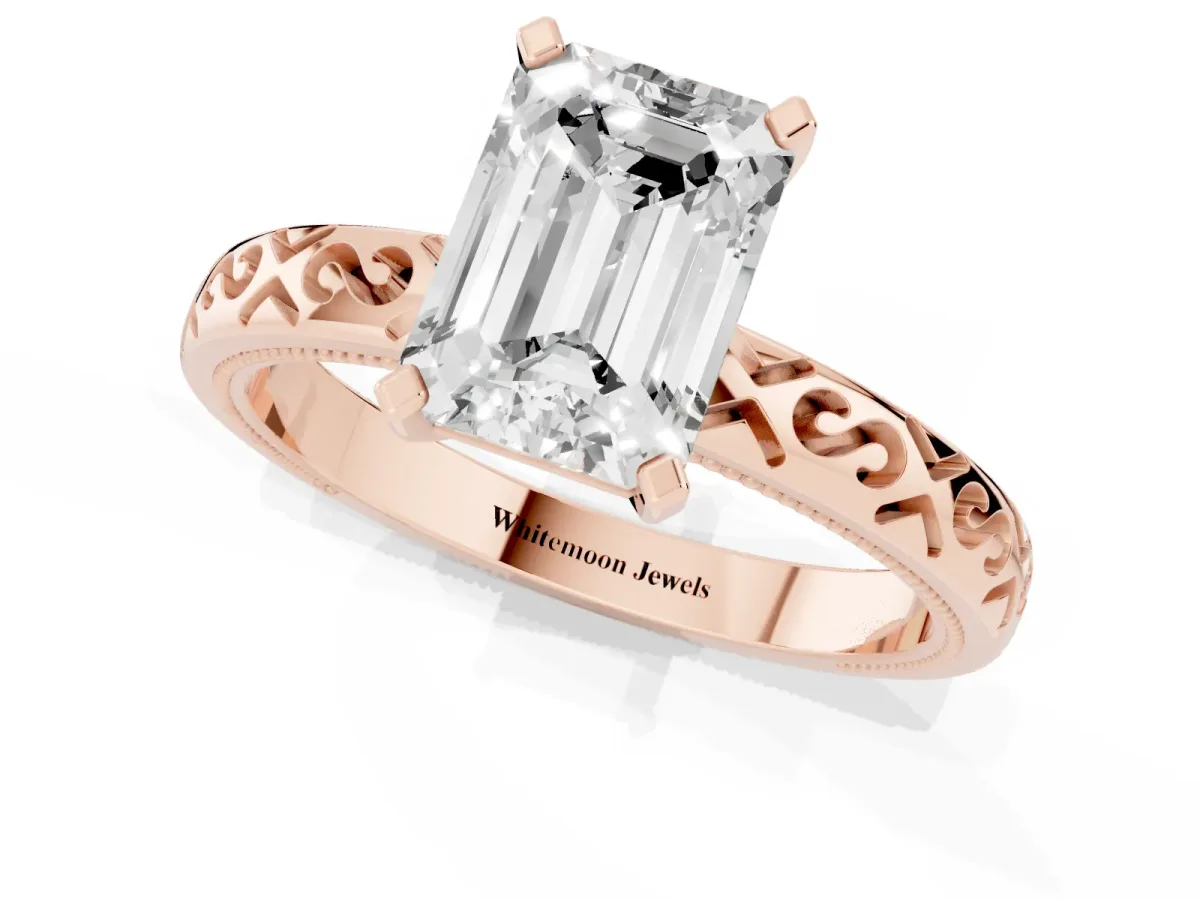Emerald Cut Solitaire Engagement Ring with Scrollwork Band and Four-Prong Setting Rose gold