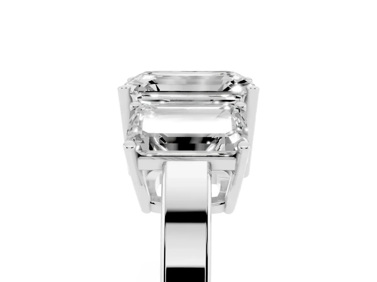 Three-Stone Emerald Cut Cut Diamond Engagement Ring with Flat Band and Four-Prong Setting Platinum