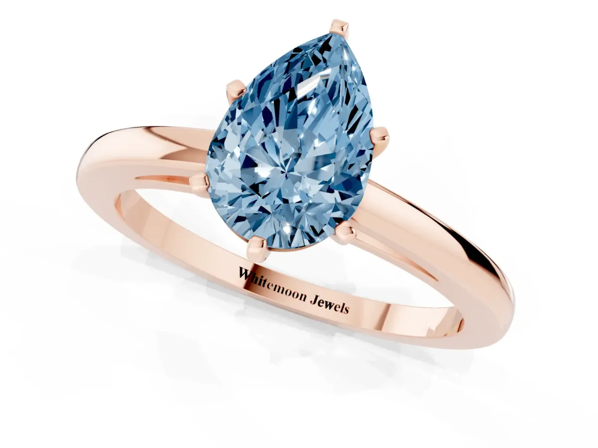 Fancy Blue Pear Cut Solitaire Diamond Engagement Ring with Four-Prong Setting on a Classic Band Rose gold