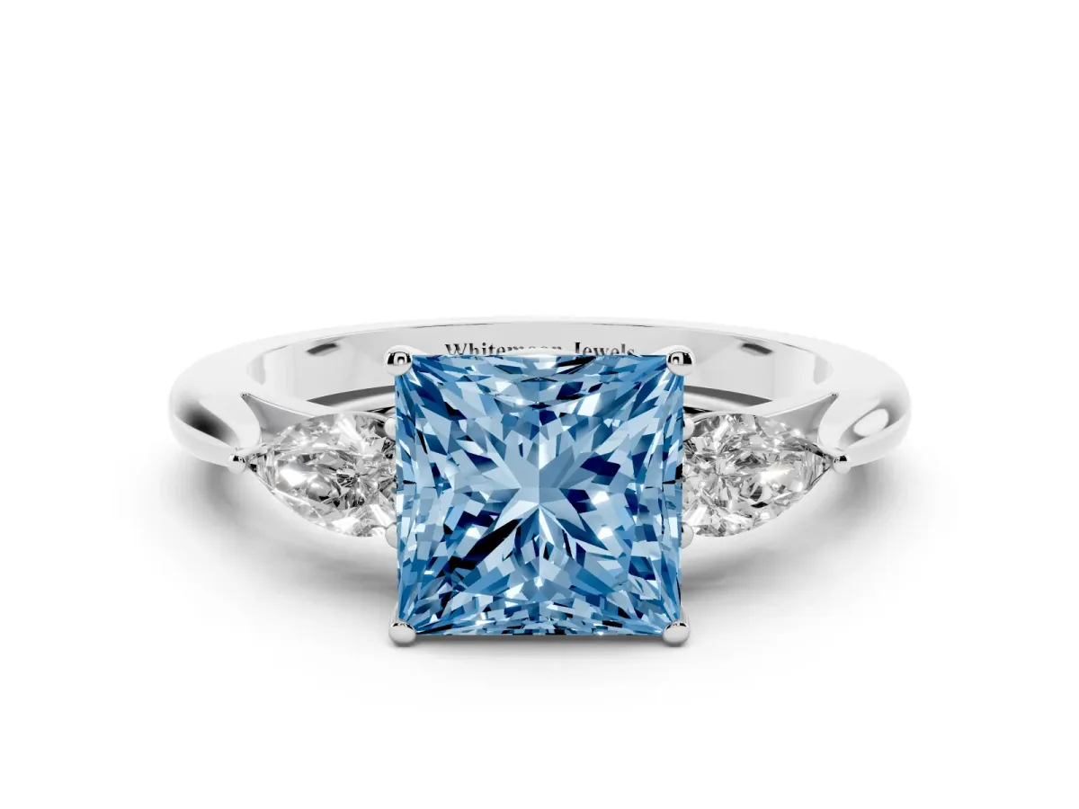 Fancy Blue Three-Stone Princess Cut Diamond Ring with Pear Side Stones in Four-Prong Setting Silver