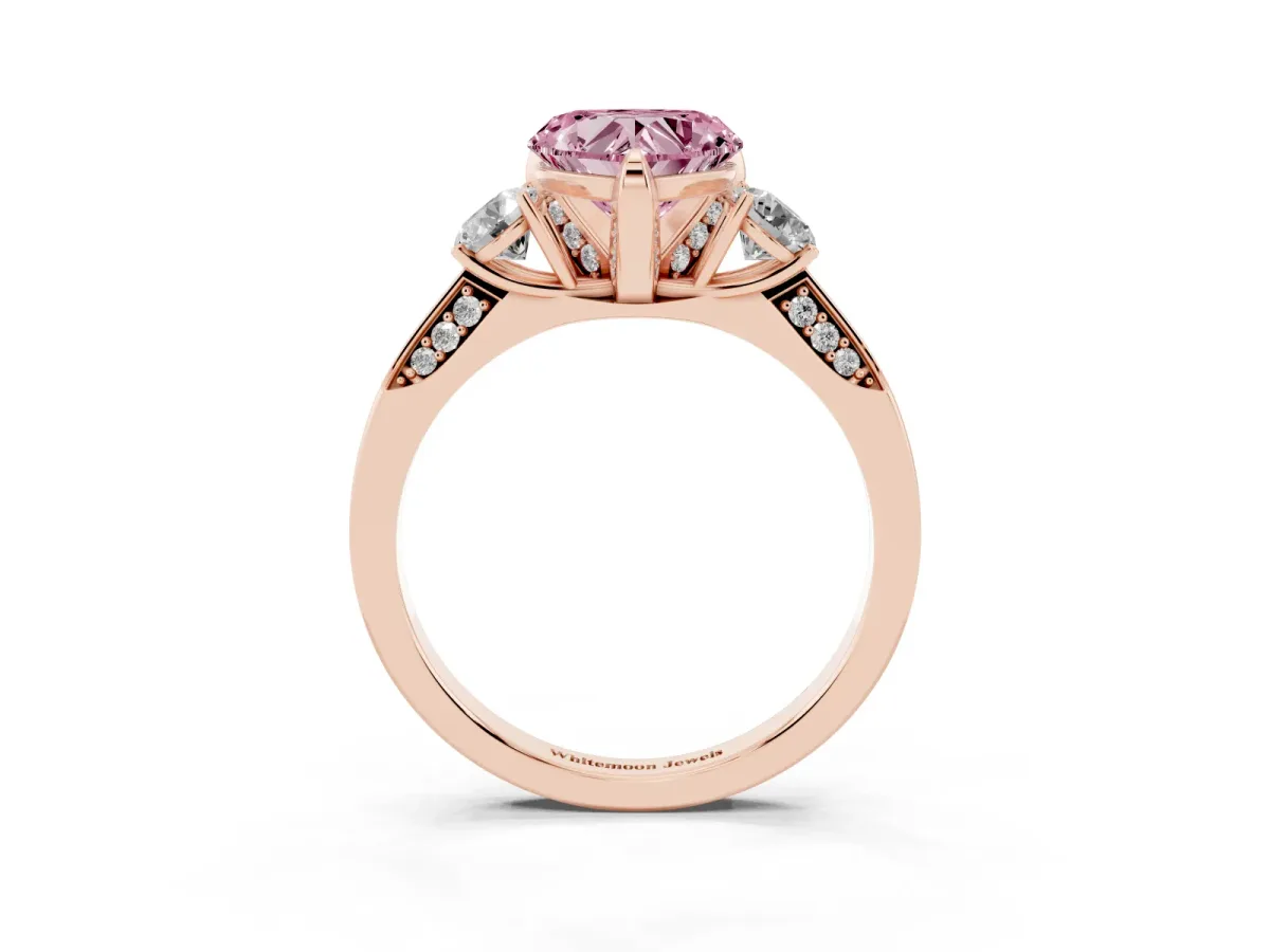 Fancy Pink Heart Cut Brilliant Three-Stone Diamond Ring with Pavé Band and Four-Prong Setting Rose gold