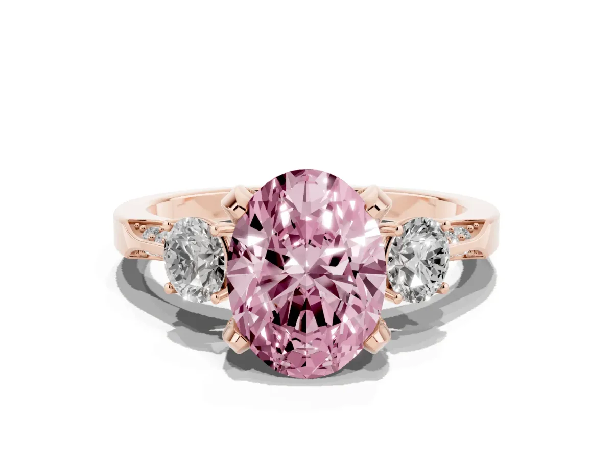 Fancy Pink Oval Cut Brilliant Three-Stone Diamond Ring with Pavé Band and Four-Prong Setting Rose gold