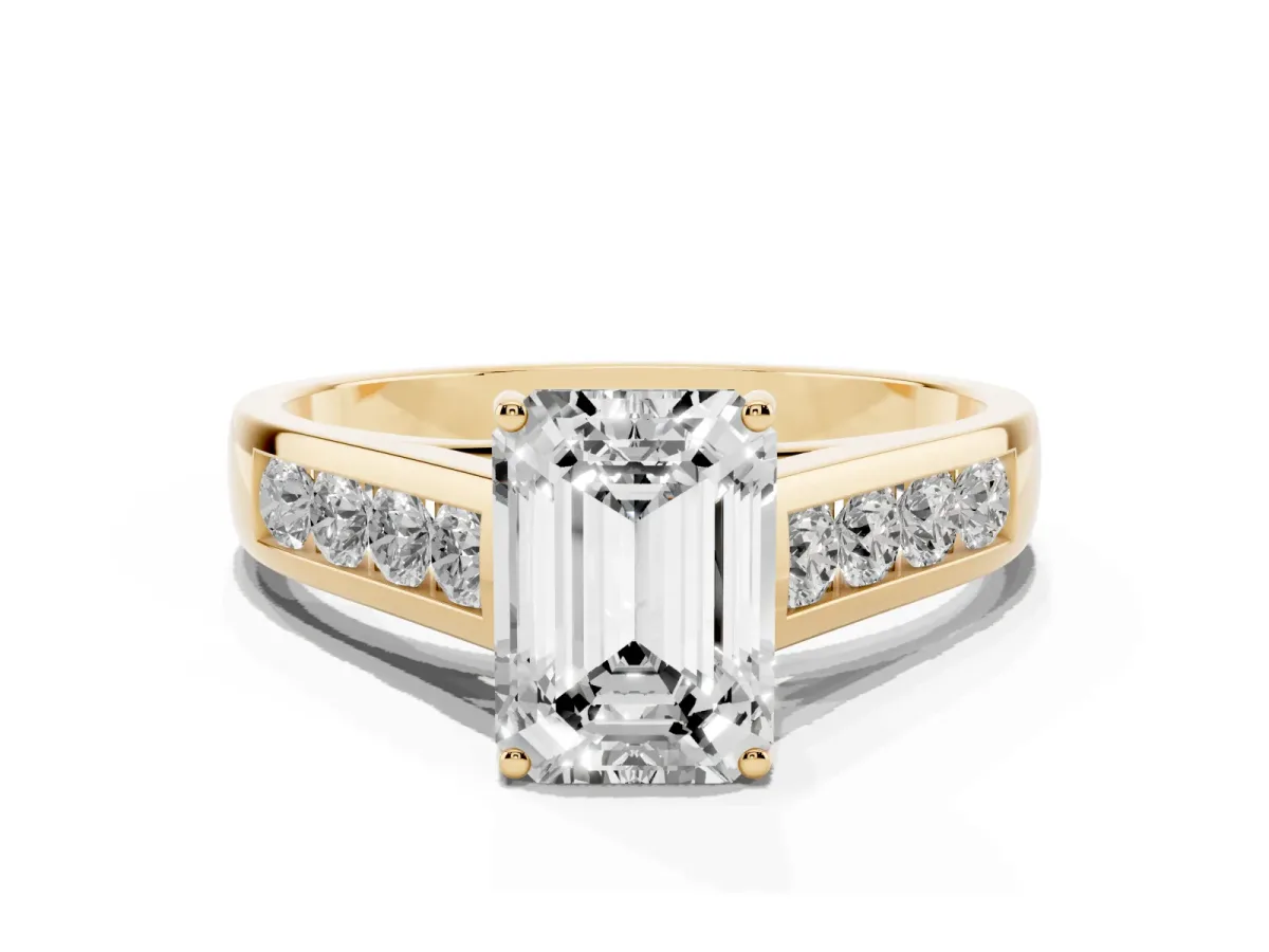 Emerald Cut Solitaire Channel-Set Diamond Engagement Ring with Four-Prong Setting Yellow gold