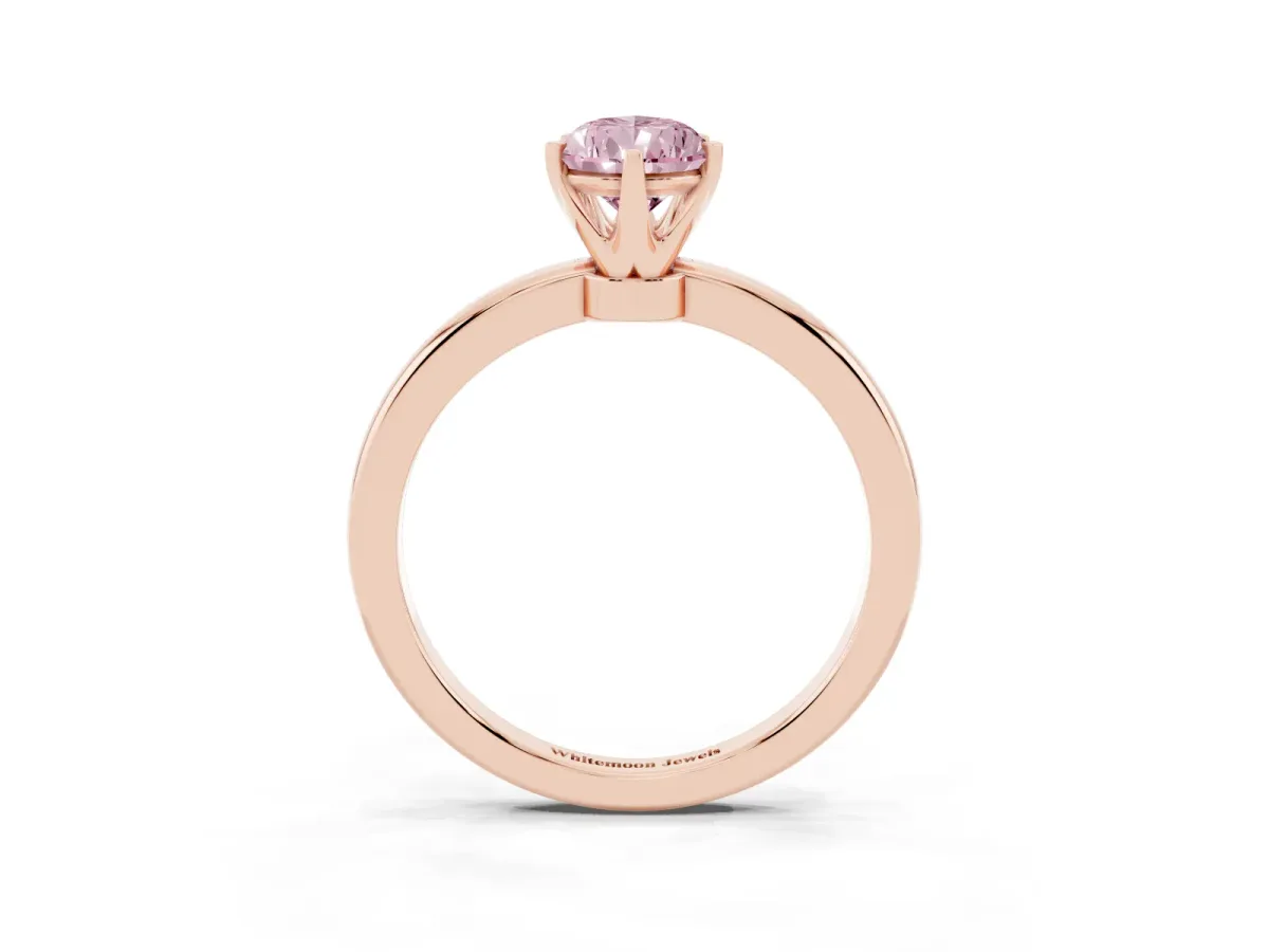 Fancy Pink Pear Cut Solitaire Diamond Ring with Six-Prong Setting on a Classic Band Rose gold