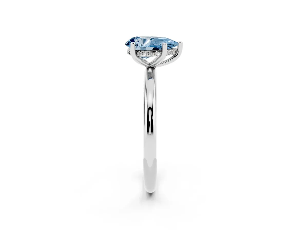 Fancy Blue Pear Cut Cut Solitaire Engagement Ring with Four-Prong Setting and Classic Band Silver