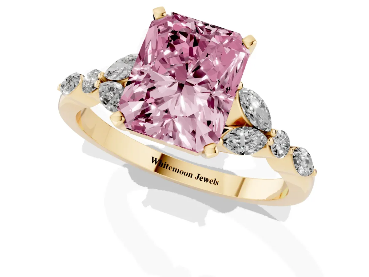 Fancy Pink Radiant Cut Diamond Solitaire Ring with Side Stones and Four-Prong Setting Yellow gold