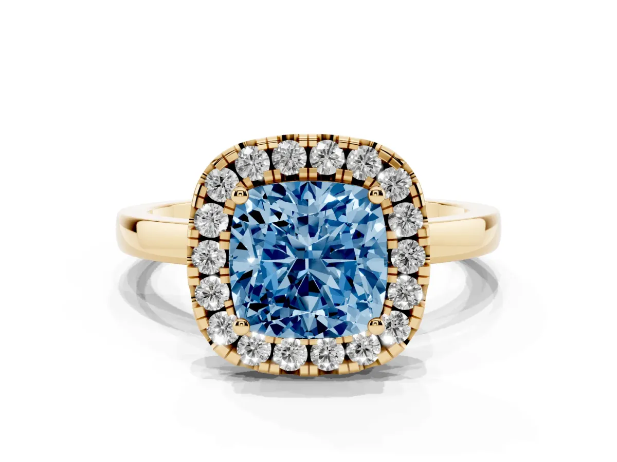 Fancy Blue Cushion Cut Halo Diamond Solitaire with Pavé Band and Four-Prong Setting Yellow gold