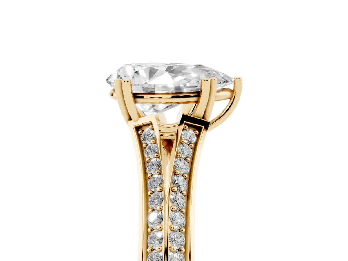 Pear Cut Diamond Split Shank Engagement Ring with Pavé Band Yellow gold