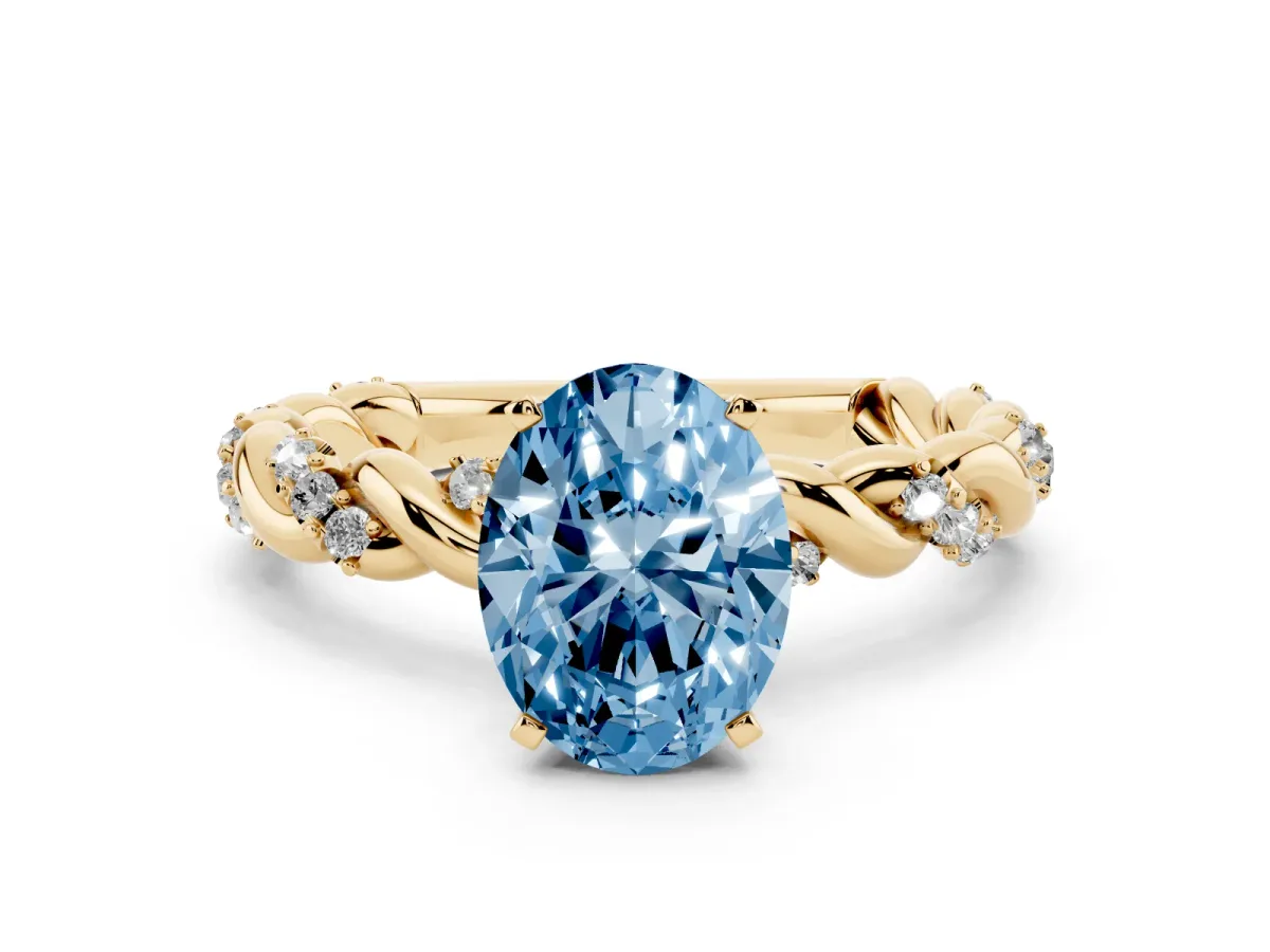 Fancy Blue Oval Cut Diamond Solitaire Ring with Twisted Band and Pavé Accents Yellow gold