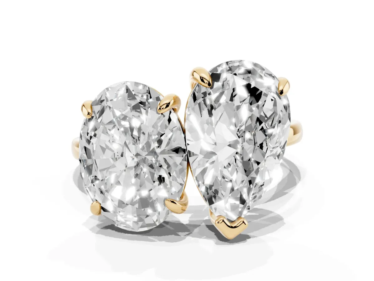 Oval and Pear Toi Moi Ring with Prong Setting and Plain Band Yellow gold