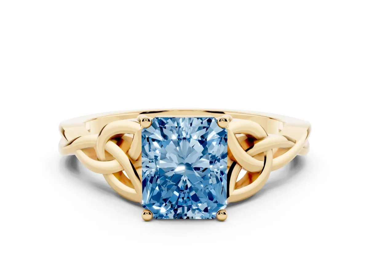 Fancy Blue Radiant Cut Diamond Solitaire Engagement Ring with Celtic Knot Band and Four-Prong Setting Yellow gold
