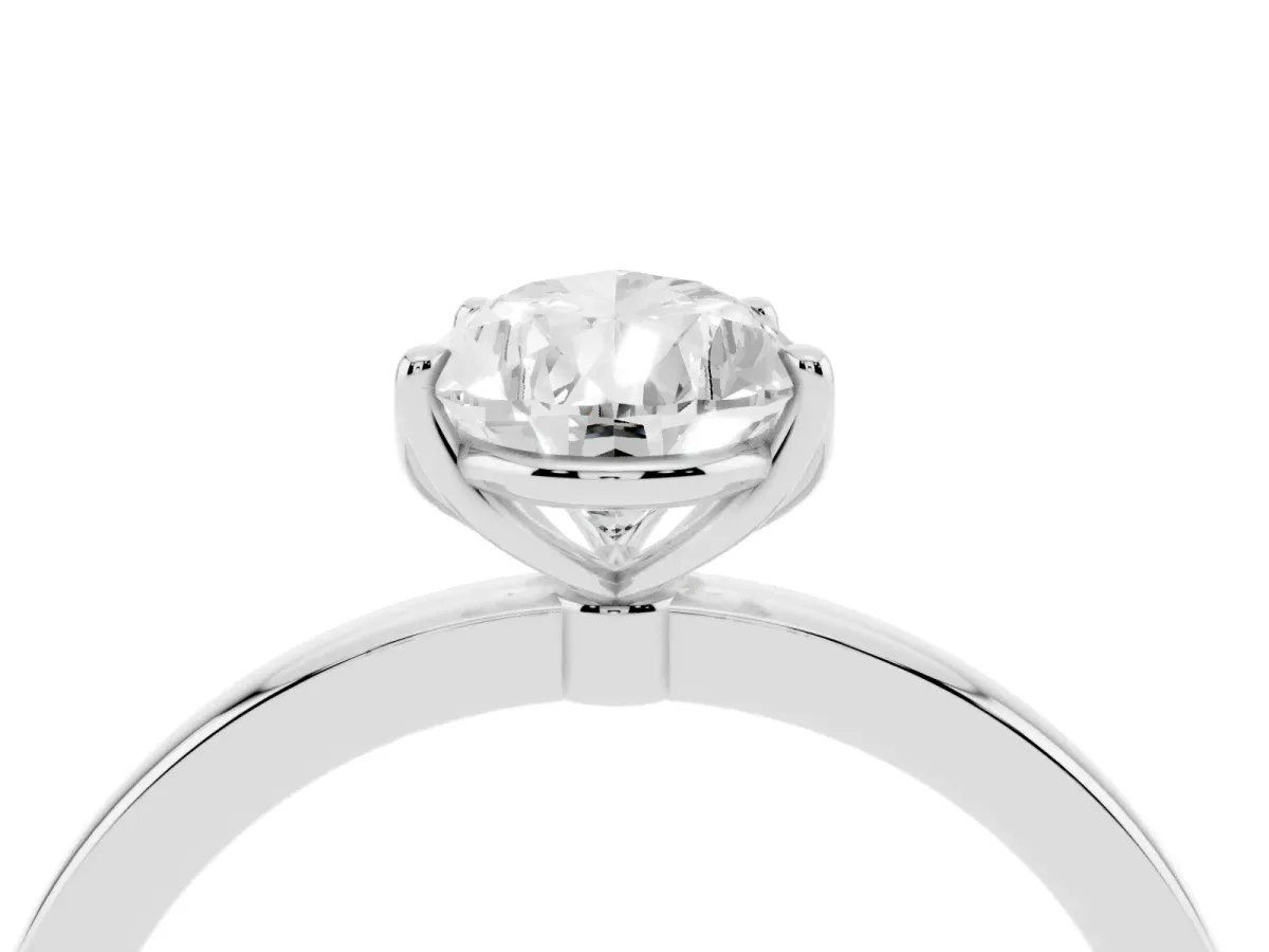 Pear Cut Diamond Solitaire Ring with Thin Band and Prong Setting Platinum