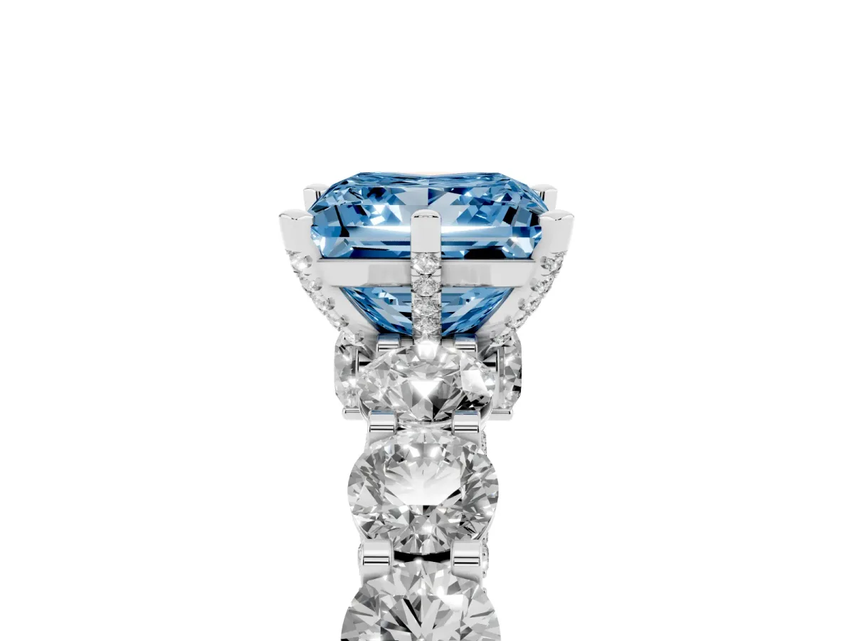 Fancy Blue Princess Cut Diamond Side Stone Engagement Ring with Four-Prong Setting Platinum