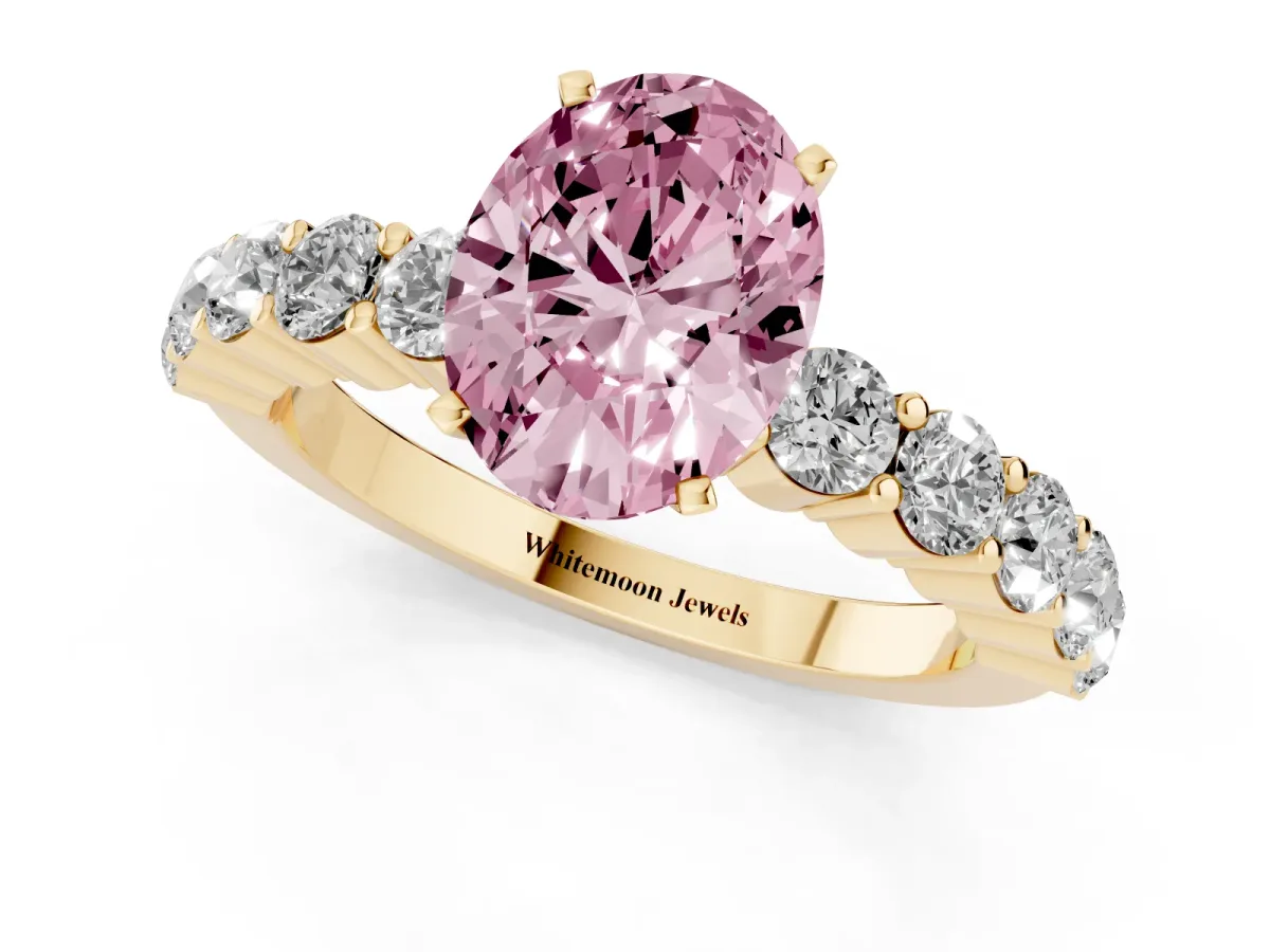 Fancy Pink Oval Cut Diamond Solitaire Ring with Shared Prong Round Side Stones Yellow gold