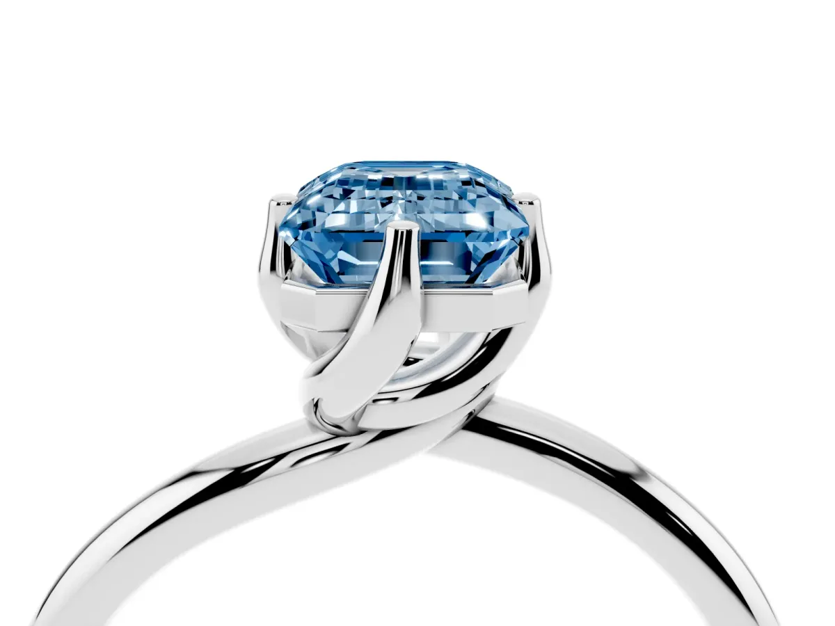 Fancy Blue Emerald Cut Diamond Solitaire Engagement Ring with Four-Prong Setting and Classic Band Silver