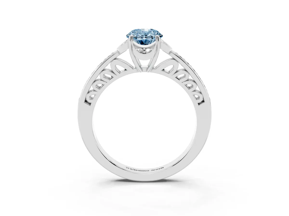 Fancy Blue Oval Cut Cut Halo Diamond Ring with Channel Set Band and Four-Prong Setting Silver