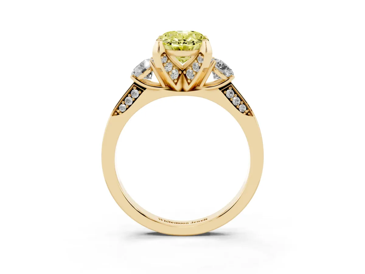 Fancy Yellow Oval Cut Brilliant Three-Stone Diamond Ring with Pavé Band and Four-Prong Setting Yellow gold