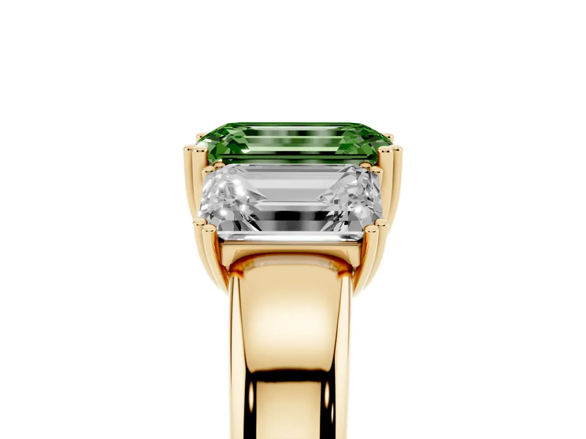 Fancy Green Three-Stone Emerald Cut Cut Diamond Ring with Channel Set Band and Four-Prong Setting Yellow gold