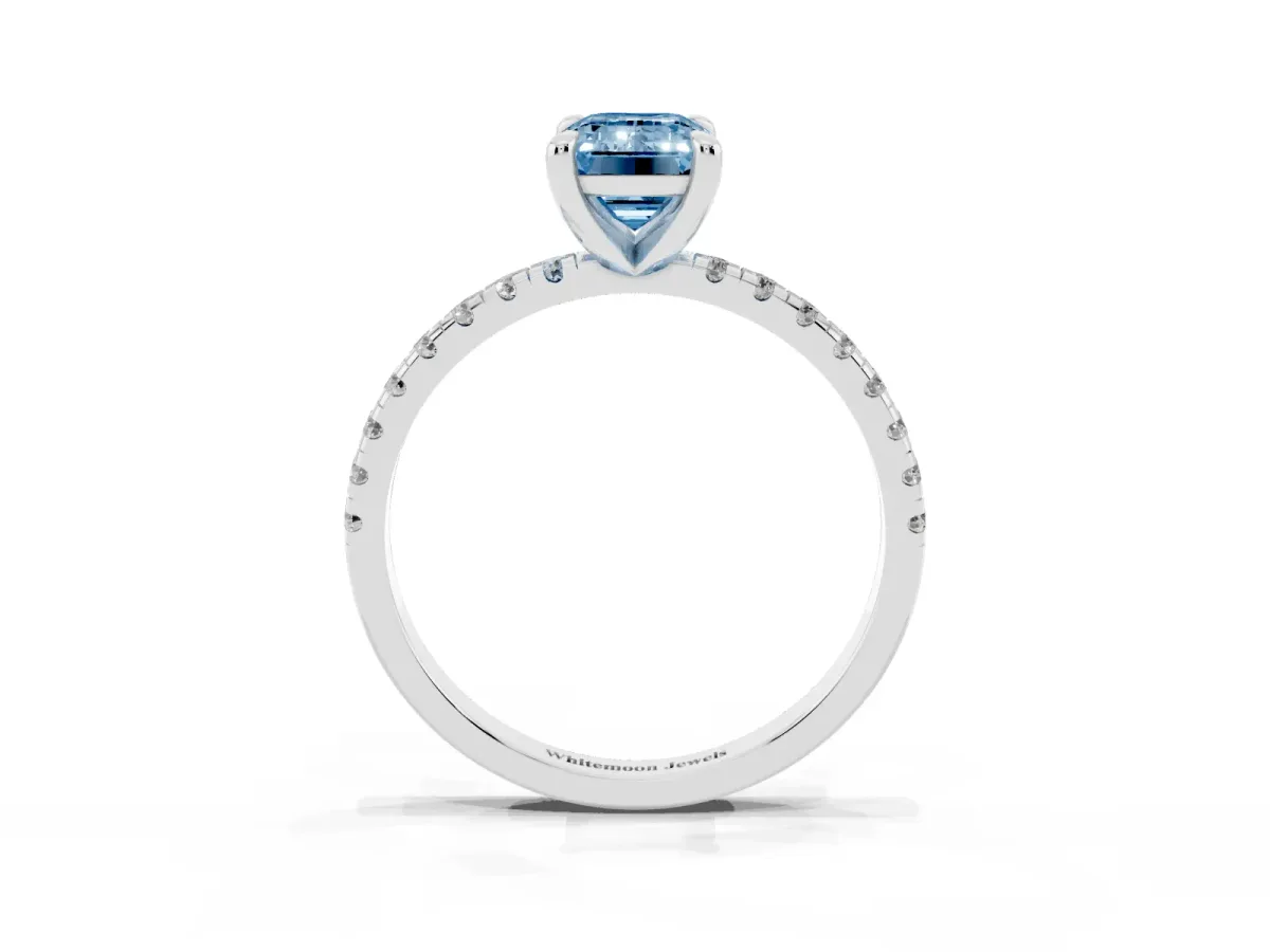 Fancy Blue Emerald Cut Diamond Brilliant Solitaire Ring with Pavé Band and Four-Prong Setting Silver