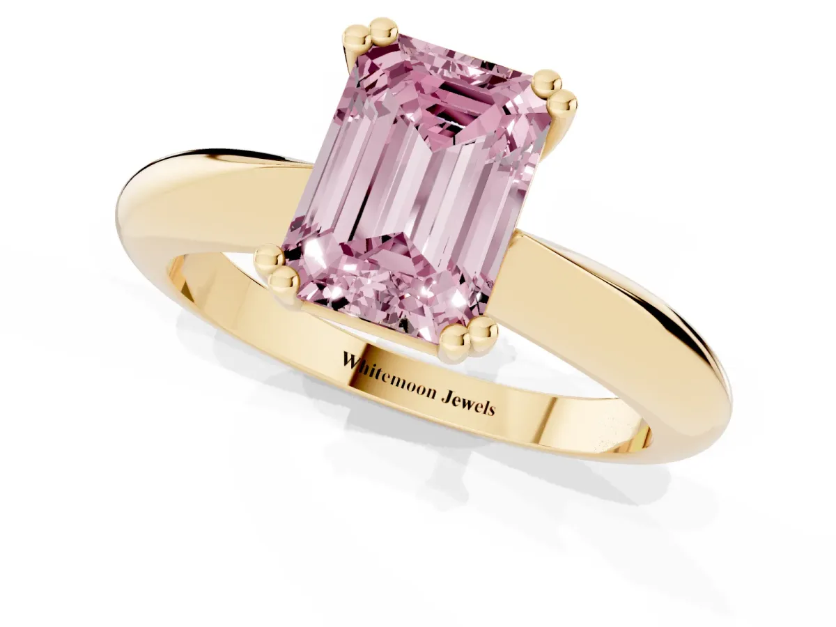 Fancy Pink Emerald Cut Cut Solitaire Engagement Ring with Tapered Band and Four-Prong Setting Yellow gold