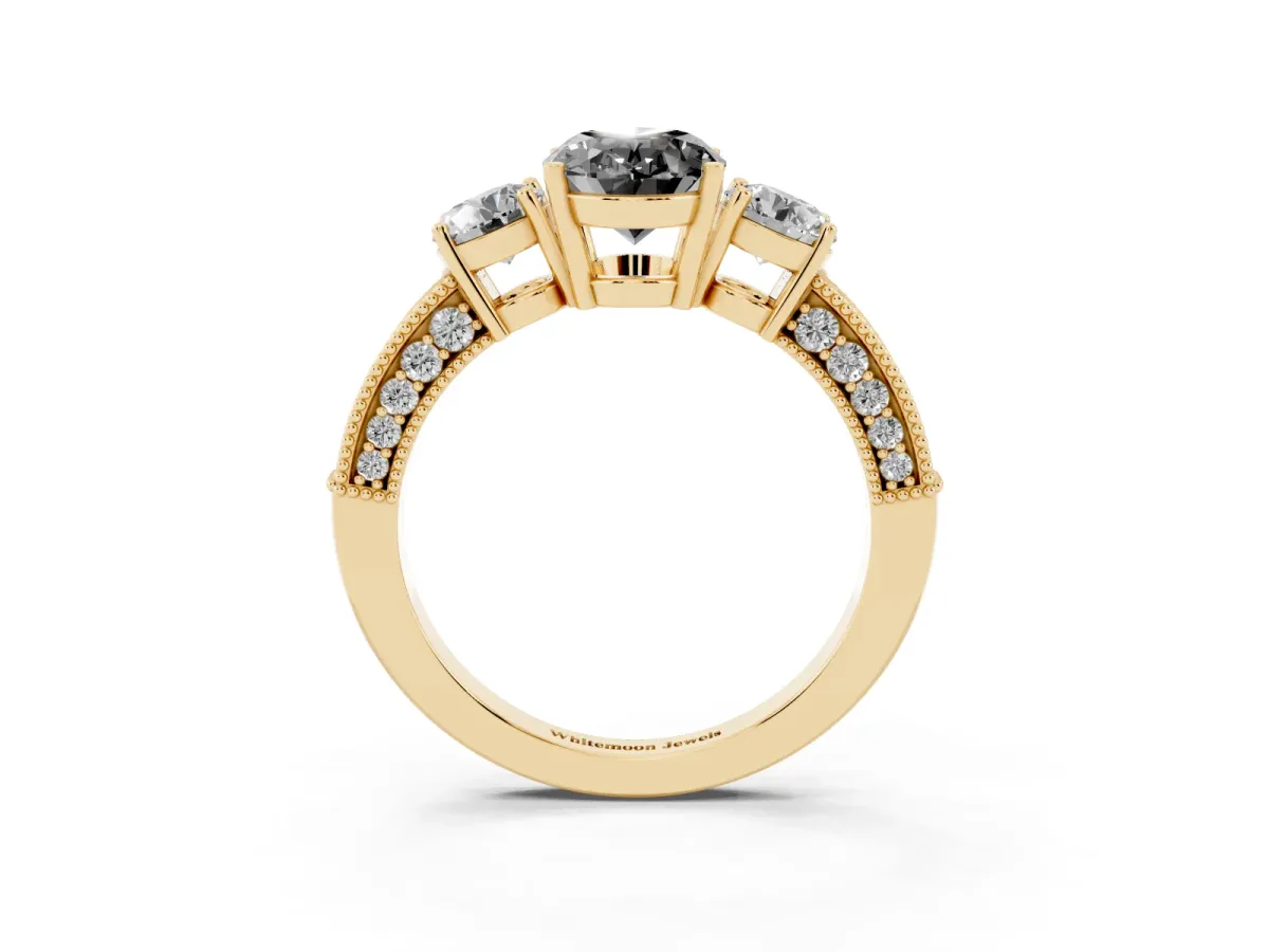 Fancy Black Oval Cut Three-Stone Diamond Ring with Pavé Band and Four-Prong Setting Yellow gold