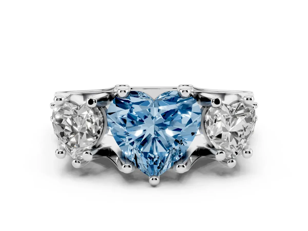 Fancy Blue Heart Cut Diamond Three-Stone Ring with Channel Set Band and Four-Prong Setting Silver